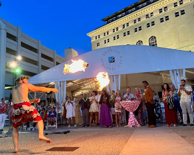fire performer in front of a crowd